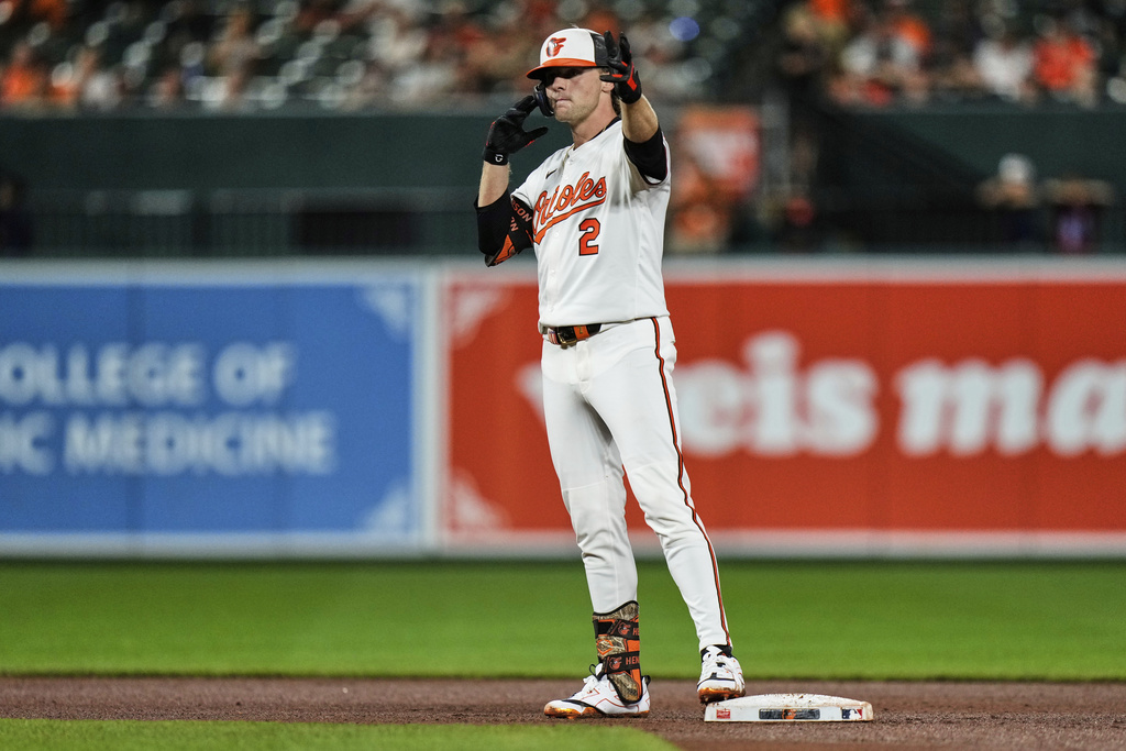Baltimore Orioles' Gunnar Henderson celebrates after hitting a double during the fourth inning of a baseball game against the Seattle Mariners, Wednesday, Aug. 13, 2025, in Baltimore. (AP Photo/Stephanie Scarbrough)