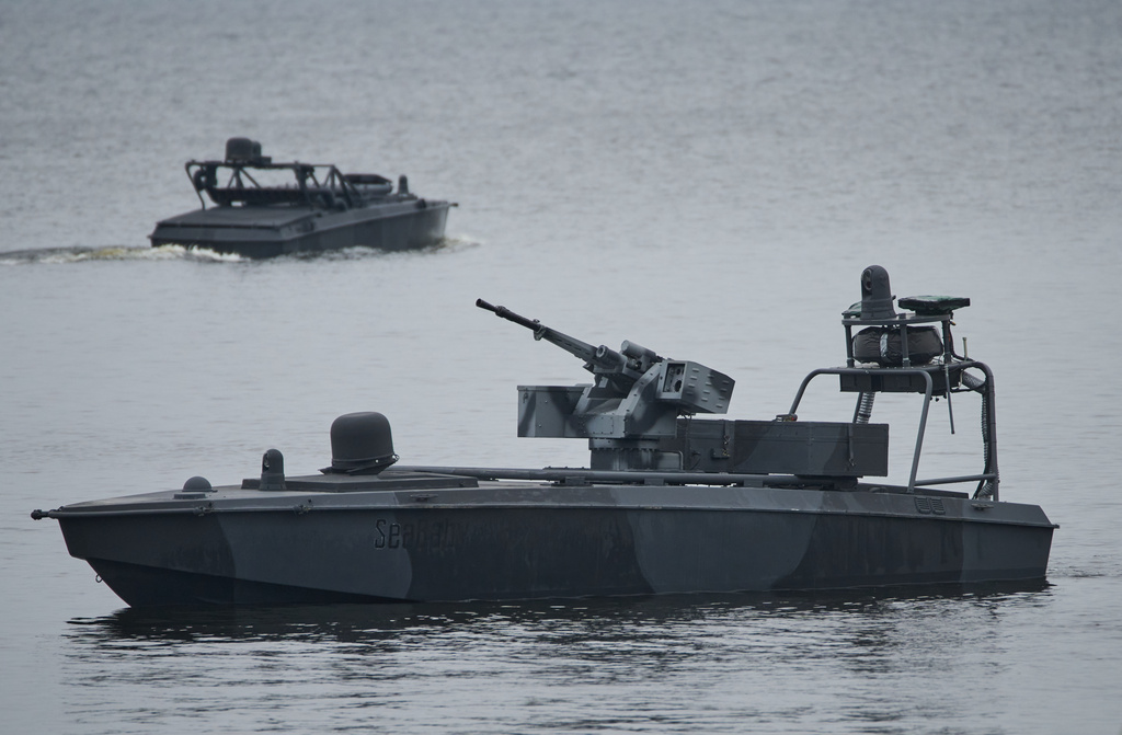 Sea Baby drones ride on the water during a demonstration by Ukraine's Security Service in an undisclosed location in Ukraine Friday, Oct. 17, 2025. (AP Photo/Efrem Lukatsky)