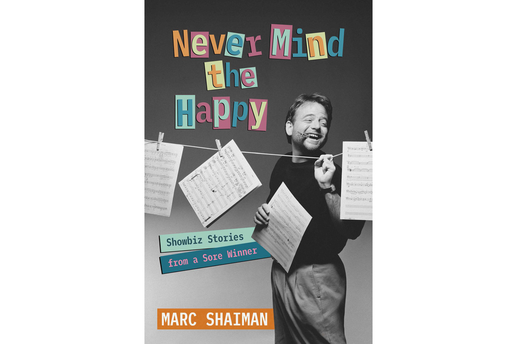This cover image released by Regalo Press shows "Never Mind the Happy: Showbiz Stories from a Sore Winner," a memoir by Marc Shaiman. (Regalo Press via AP)