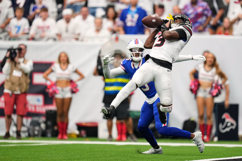 Houston Texans cornerback Kamari Lassiter (3) breaks up a pass against the Buffalo Bills during the second half of an NFL football game, Sunday, Sept. 13, 2026, in Houston. (AP Photo/Ashley Landis)