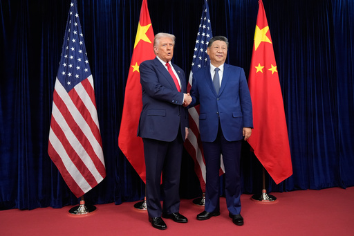 President Donald Trump, left, and Chinese President Xi Jinping, right, shake hands before their meeting at Gimhae International Airport in Busan, South Korea, Thursday, Oct. 30, 2025. (AP Photo/Mark Schiefelbein) President Donald Trump, left, and Chinese President Xi Jinping, right, shake hands before their meeting at Gimhae International Airport in Busan, South Korea, Thursday, Oct. 30, 2025. (AP Photo/Mark Schiefelbein)