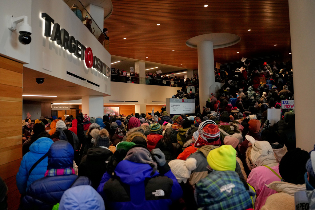 Attendees file into Target Center during a rally against federal immigration enforcement on Friday, Jan. 23, 2026, in Minneapolis. (AP Photo/Angelina Katsanis)