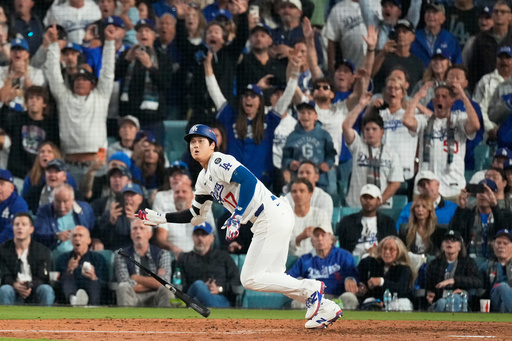 Los Angeles Dodgers' Shohei Ohtani watches his RBI-Double against the Toronto Blue Jays during the fifth inning in Game 3 of baseball's World Series, Monday, Oct. 27, 2025, in Los Angeles.(AP Photo/Mark J. Terrill) Los Angeles Dodgers' Shohei Ohtani watches his RBI-Double against the Toronto Blue Jays during the fifth inning in Game 3 of baseball's World Series, Monday, Oct. 27, 2025, in Los Angeles.(AP Photo/Mark J. Terrill)