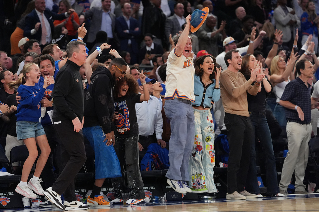New York Knicks fans react during the second half of Game 1 in the Eastern Conference finals NBA basketball playoffs series against the Cleveland Cavaliers, Tuesday, May 19, 2026, in New York. (AP Photo/Seth Wenig)