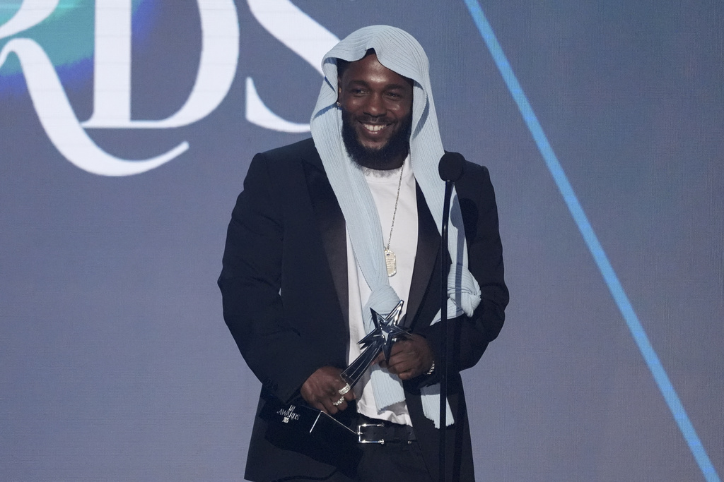 FILE - Kendrick Lamar accepts the award for album of the year for "GNX" during the BET Awards on June 9, 2025, at the Peacock Theater in Los Angeles. (AP Photo/Chris Pizzello, File)