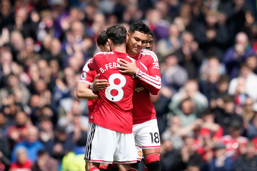 Manchester United's Bruno Fernandes and Manchester United's Casemiro during the English Premier League soccer match between Manchester United and Nottingham Forest in Manchester, England, Sunday, May 17, 2026. (AP Photo/Dave Thompson)