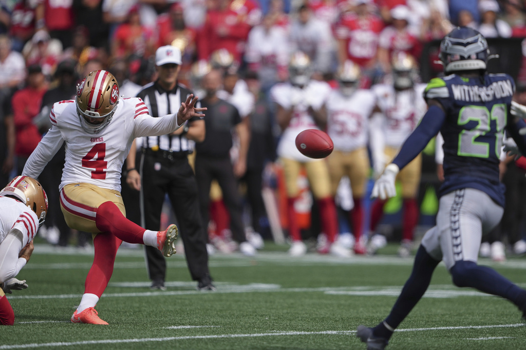 San Francisco 49ers place-kicker Jake Moody (4) attempts to kick a field goal that was incomplete during the first half of an NFL football game against the Seattle Seahawks, Sunday, Sept. 7, 2025, in Seattle. (AP Photo/Lindsey Wasson)
