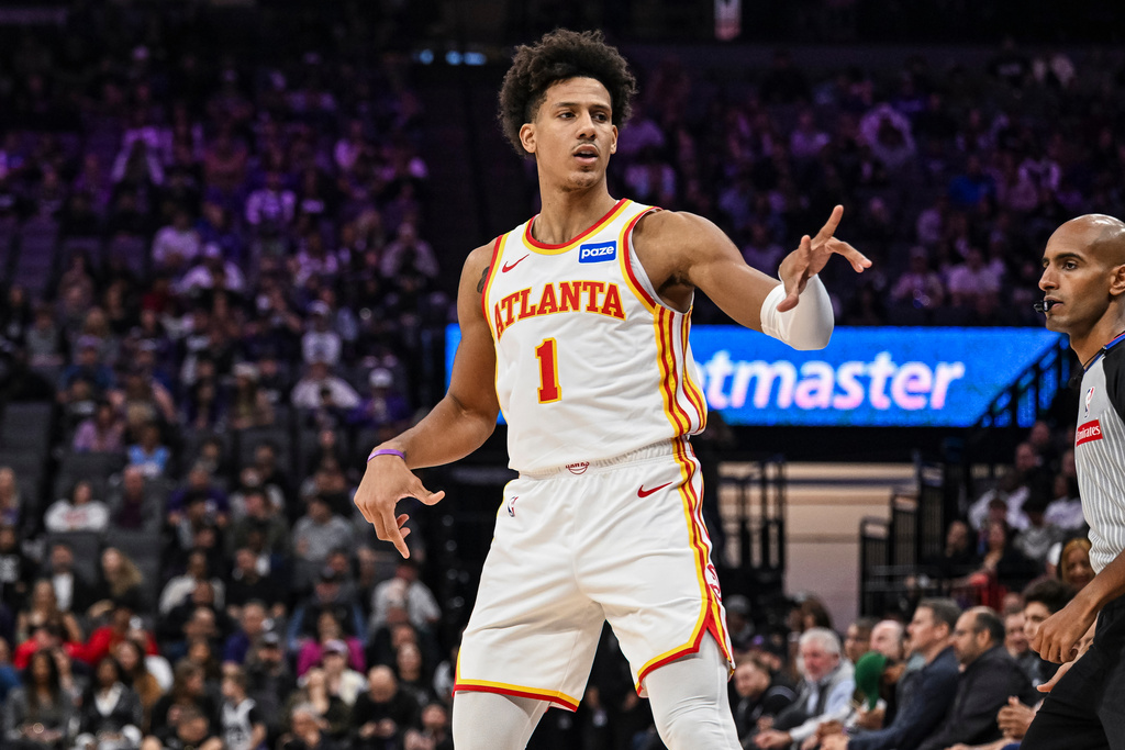 Atlanta Hawks forward Jalen Johnson (1) reacts after a three point basket during the first half of an NBA basketball game against the Sacramento Kings, Wednesday, Nov. 12, 2025, in Sacramento, Calif. (AP Photo/Justine Willard)