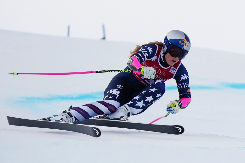 United States' Lindsey Vonn speeds down the course during an alpine ski, women's World Cup super-G in Val d'Isere, France, Sunday, Dec. 21, 2025. (AP Photo/Pier Marco Tacca)