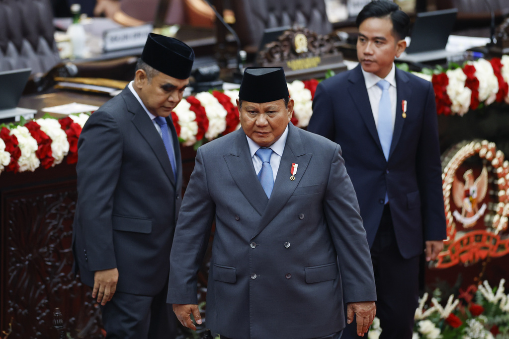 Indonesian President Prabowo Subianto leaves after delivering his annual State of the Nation Address ahead of the country's Independence Day, in Jakarta, Indonesia, Monday, Aug. 15, 2025. (Bay Ismoyo/Pool Photo via AP)