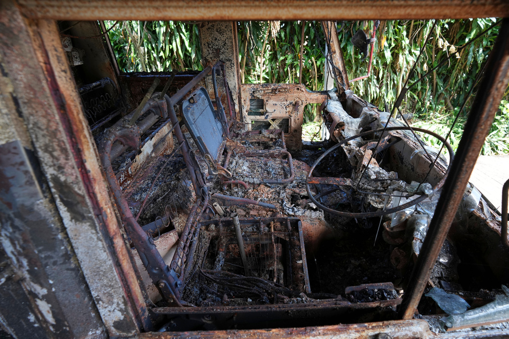 In this photo taken during a trip supervised by pro-military Myanmar media, a damaged fire engine is seen at the Fire Service Department building in Kyaukme, northern Shan State, Myanmar, Friday, Oct. 10, 2025. (AP Photo/Aung Shine Oo)
