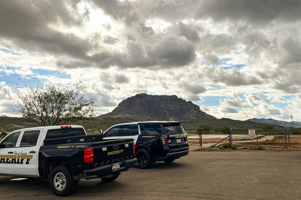 This photo provided by the Pinal County Sheriff’s Office shows emergency personnel responding to a crashed helicopter in the mountains near Telegraph Canyon, south of Superior, Ariz., on Jan. 2, 2026. (Pinal County Sheriff’s Office via AP)