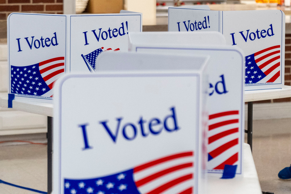 FILE - Privacy booths are seen on the morning of the South Carolina Republican primary election at a church in Cayce, S.C., Feb. 24, 2024. (AP Photo/Andrew Harnik, File)