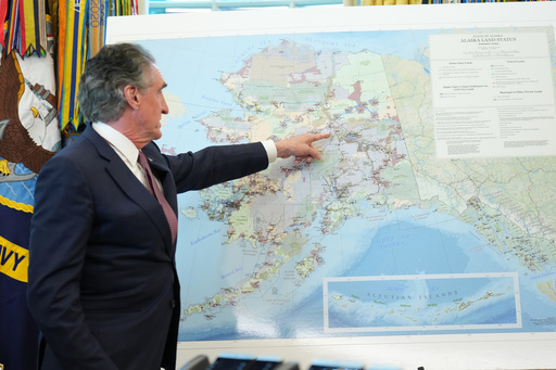Interior Secretary Doug Burgum points to a map of Alaska as he speaks before President Donald Trump signs an executive order in the Oval Office at the White House, Monday, Oct. 6, 2025, in Washington. (AP Photo/Jacquelyn Martin) Interior Secretary Doug Burgum points to a map of Alaska as he speaks before President Donald Trump signs an executive order in the Oval Office at the White House, Monday, Oct. 6, 2025, in Washington. (AP Photo/Jacquelyn Martin)