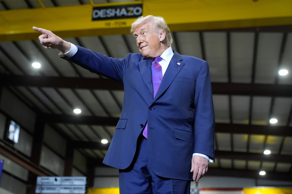 President Donald Trump arrives to speak at Coosa Steel Corporation in Rome, Ga., Thursday, Feb. 19, 2026. (AP Photo/Mark Schiefelbein)