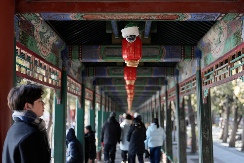 A CCTV camera is positioned beside lanterns at the Summer Palace in Beijing, Tuesday, Feb. 4, 2025. (AP Photo/Aaron Favila)