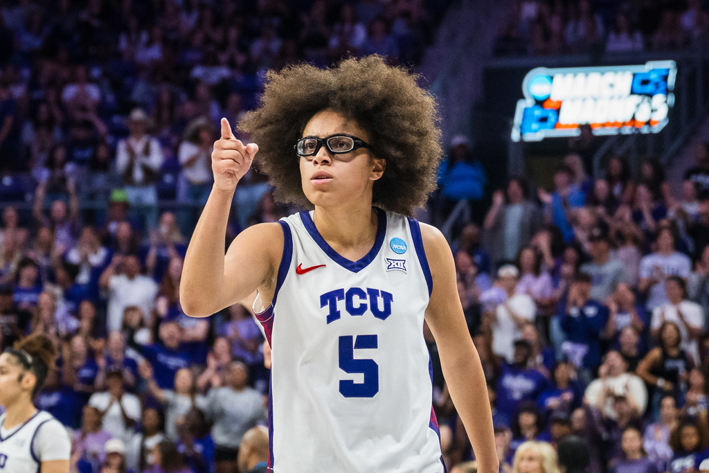 TCU guard Olivia Miles (5) reacts during the first half in the second round of the NCAA college basketball tournament Sunday, March 22, 2026, Fort Worth, Texas. (AP Photo/Jessica Tobias)