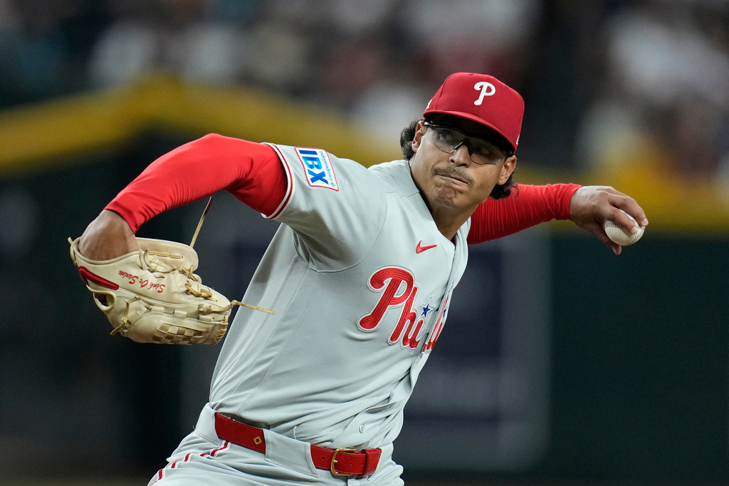 Philadelphia Phillies starting pitcher Jesús Luzardo throws against the Arizona Diamondbacks during the first inning of a baseball game, Tuesday, Sept. 1, 2026, in Phoenix. (AP Photo/Ross D. Franklin)
