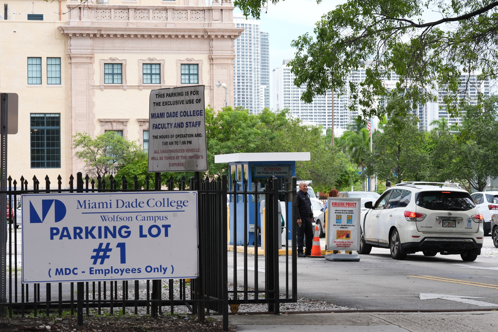 Republican Florida Gov. Ron DeSantis is proposing that President Donald Trump's presidential library be built in a parking lot that is currently used by Miami-Dade College staff and faculty and is adjacent to the Freedom Tower, Tuesday, Sept. 23, 2025, in Miami. (AP Photo/Marta Lavandier)