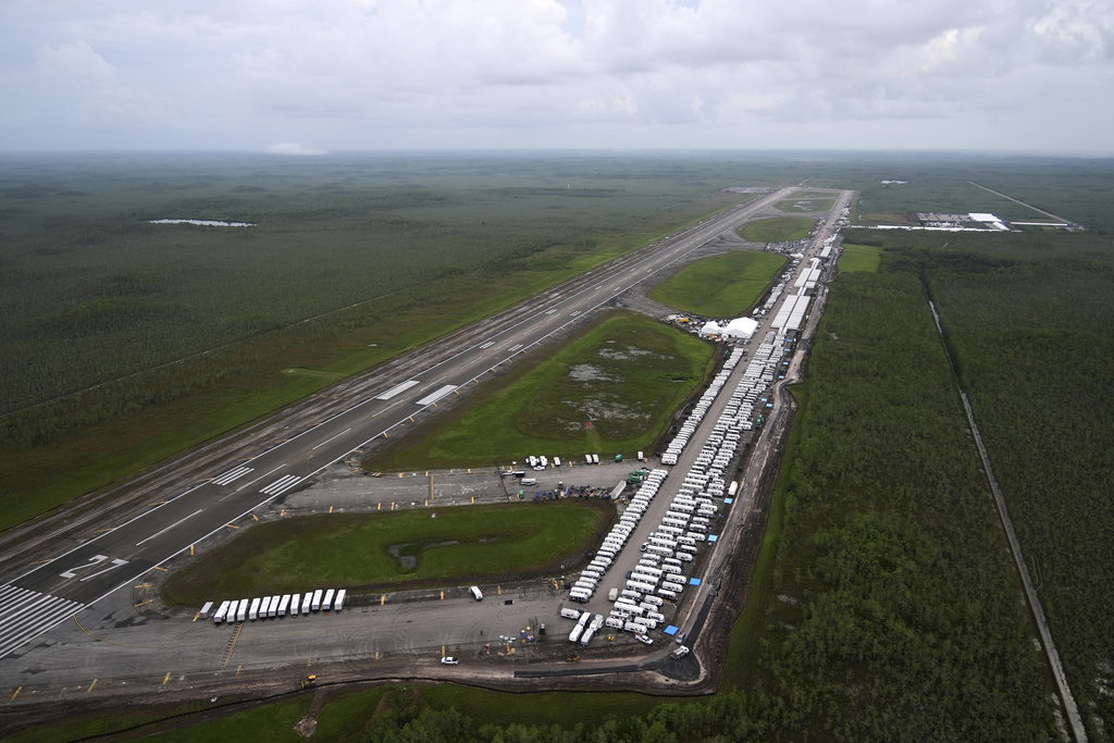 FILE - Work progresses on the Dade-Collier Training and Transition facility in the Florida Everglades, July 4, 2025, in Ochopee, Fla. (AP Photo/Rebecca Blackwell, file)