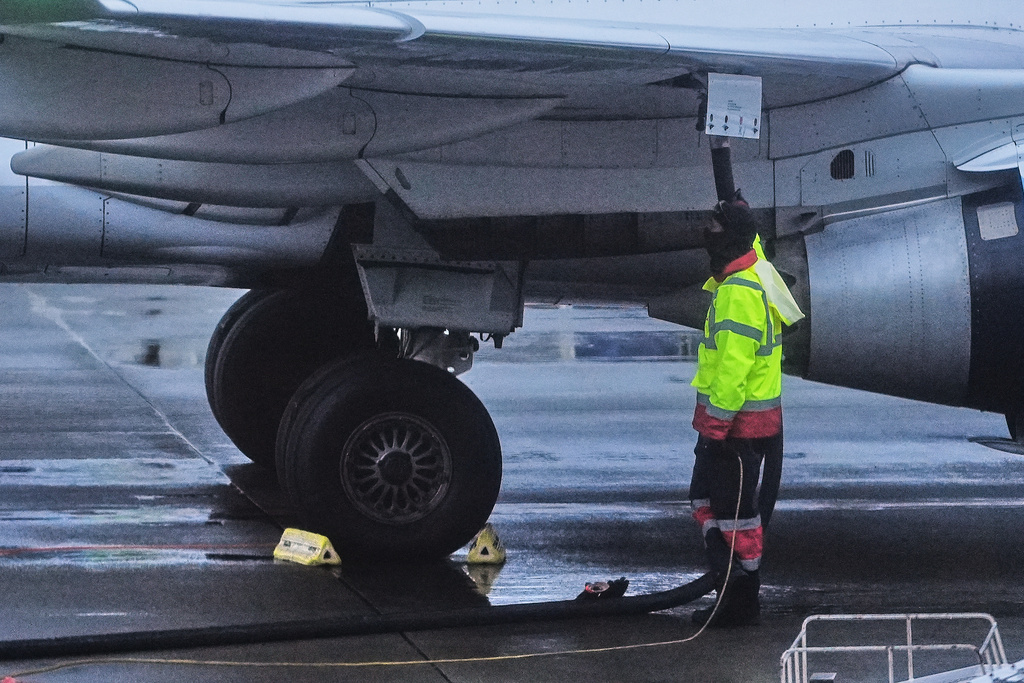 FILE - An airplane is refueled at Seattle-Tacoma International Airport in SeaTac, Wash., on Sunday, Nov. 23, 2025. (AP Photo/Lindsey Wasson, File)
