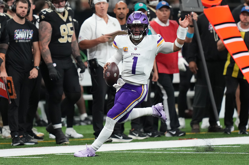 Minnesota Vikings quarterback Kyler Murray (1) runs against the New Orleans Saints during the second half of an NFL football game in New Orleans, Sunday, Oct. 11, 2026. (AP Photo/Matthew Hinton)