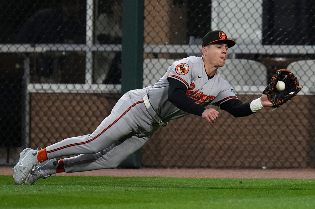 Baltimore Orioles right fielder Tyler O'Neill catches a flyout hit by Chicago White Sox's Tristan Peters during the third inning of a baseball game Monday, April 6, 2026, in Chicago. (AP Photo/Erin Hooley)
