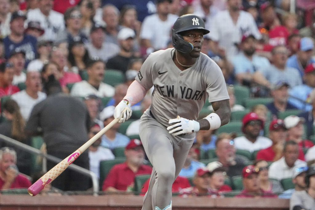 New York Yankees' Jazz Chisholm Jr. watches his two-run home run during the first inning of a baseball game against the St. Louis Cardinals Friday, Aug. 15, 2025, in St. Louis. (AP Photo/Jeff Roberson)