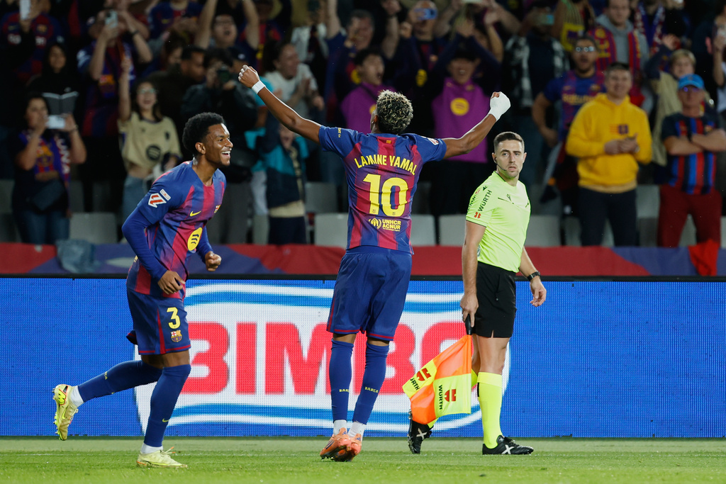 Barcelona's Lamine Yamal celebrates after scoring his side's opening goal during a Spanish La Liga soccer match between FC Barcelona and Elche CF in Barcelona, Spain, Sunday, Nov. 2, 2025. (AP Photo/Joan Monfort)