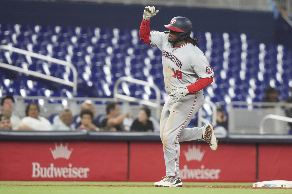 Washington Nationals' Josh Bell (19) runs the bases after hitting a two run home run during the sixth inning of a baseball game against the Miami Marlins, Monday, Sept. 8, 2025, in Miami. (AP Photo/Lynne Sladky)