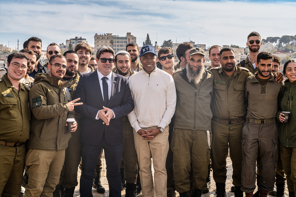 This image released by the Mayoral Photography Office shows New York Mayor Eric Adams, center, as he tours the City of David during his trip to Israel, Nov. 17, 2025. (Benny Polatseck/Mayoral Photography Office via AP)