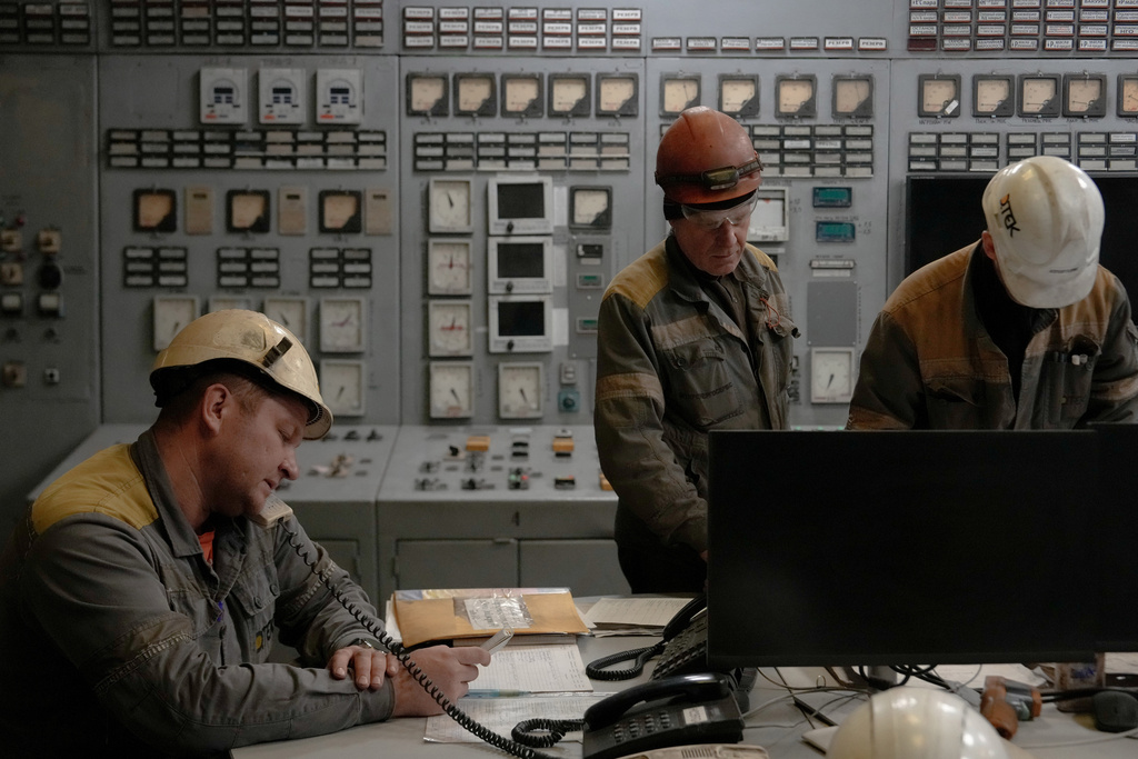 Power unit engineers work in the control room of a Ukrainian thermal power plant, Wednesday, Oct. 29, 2025. (AP Photo/Julia Demaree Nikhinson)