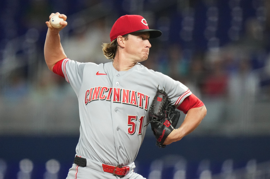 Cincinnati Reds pitcher Brady Singer (51) throws during the first inning of a baseball game against the Miami Marlins, Wednesday, April 8, 2026, in Miami. (AP Photo/Lynne Sladky)
