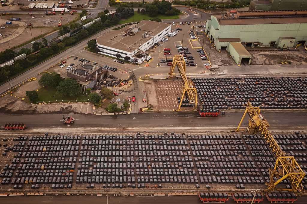 Rolled coils of steel sit in the yard at the ArcelorMittal Dofasco steel plant in Hamilton, Ont. on Thursday, Aug. 20, 2026. (Nick Iwanyshyn /The Canadian Press via AP)