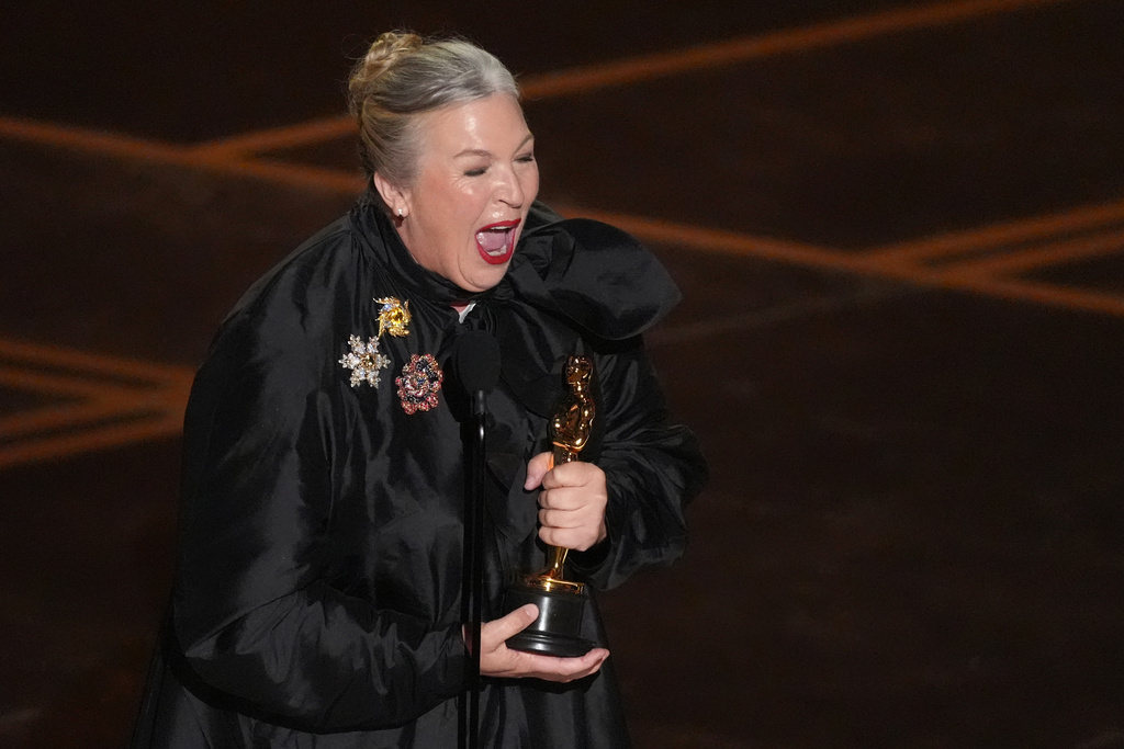 Kate Hawley accepts the award for costume design for "Frankenstein" during the Oscars on Sunday, March 15, 2026, at the Dolby Theatre in Los Angeles. (AP Photo/Chris Pizzello)