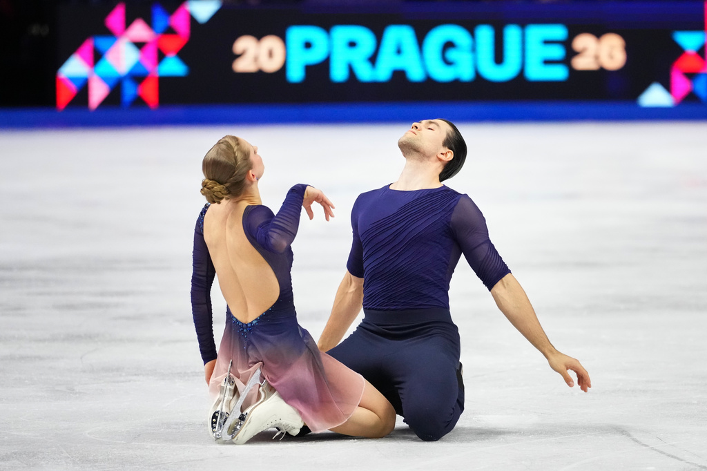 Minerva Fabienne Hase and Nikita Volodin of Germany perform during the pairs free skating at the Figure Skating World Championships in Prague, Czech Republic, Thursday, March 26, 2026. (AP Photo/Petr David Josek)