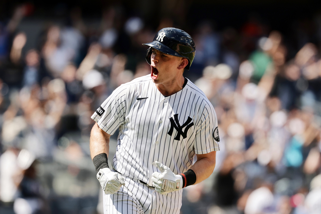 New York Yankees' Ben Rice reacts after hitting a three-run home run in the seventh inning during the first baseball game of a doubleheader against the Pittsburgh Pirates, Wednesday, July 22, 2026, in New York. (AP Photo/Adam Hunger)