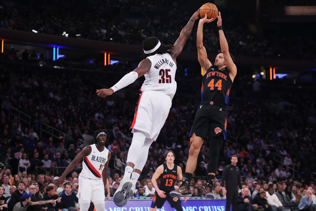 Portland Trail Blazers' Robert Williams III (35) blocks a shot by New York Knicks' Landry Shamet (44) during the first half of an NBA basketball game Friday, Jan. 30, 2026, in New York. (AP Photo/Frank Franklin II)