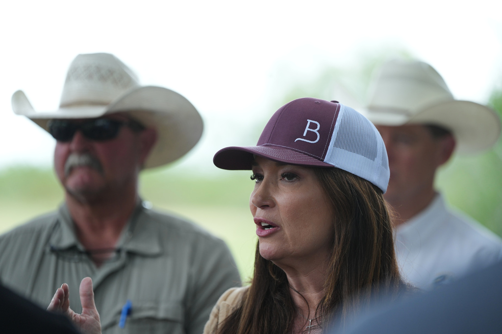 U.S. Agriculture Secretary Brooke Rollins talks about a sterile fly dispersal station placed by the U.S. Department of Agriculture to combat the spread of the New World screwworm fly on grounds of a ranch near La Pryor, Texas, Thursday, June 11, 2026. (AP Photo/Eric Gay)