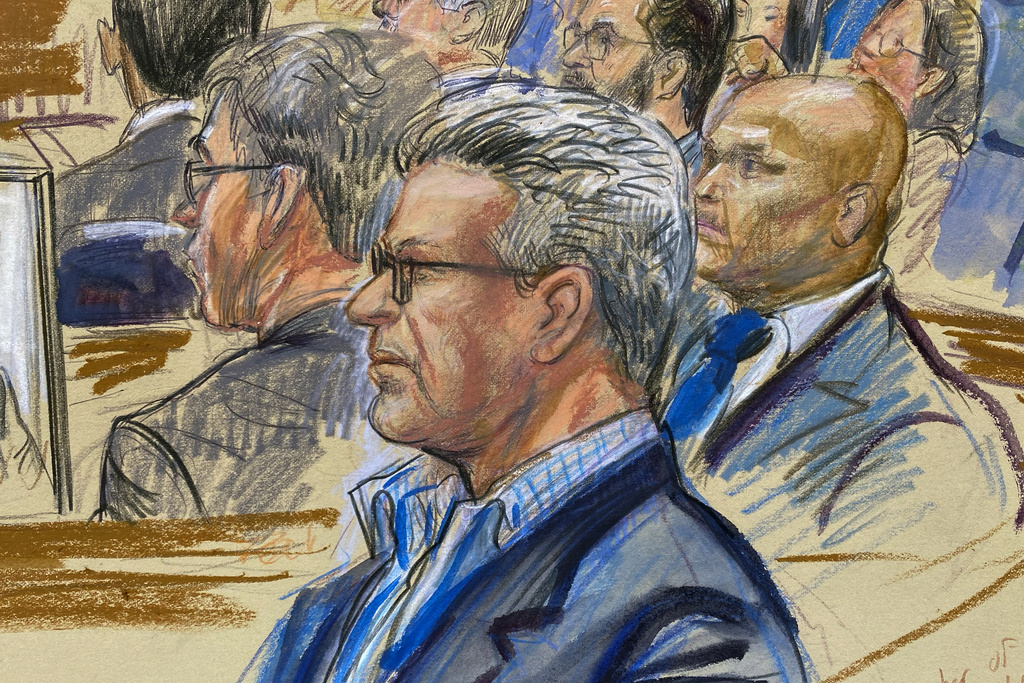 FILE - This artist sketch depicts Salah Al-Ejaili, foreground with glasses, a former Al-Jazeera journalist, before the U.S. District Court in Alexandria, Va., April 16, 2024. (Dana Verkouteren via AP, File)