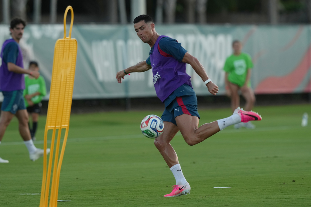 Portugal's Cristiano Ronaldo runs drills during the men's national soccer team training session ahead of their FIFA World Cup soccer tournament Saturday, June 13, 2026, in Palm Beach Gardens, Fla. (AP Photo/Marta Lavandier)