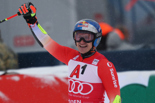 Switzerland's Marco Odermatt celebrates at the finish area of an alpine ski, men's World Cup giant slalom, in Soelden, Austria, Sunday, Oct. 26, 2025. (AP Photo/Alessandro Trovati) Switzerland's Marco Odermatt celebrates at the finish area of an alpine ski, men's World Cup giant slalom, in Soelden, Austria, Sunday, Oct. 26, 2025. (AP Photo/Alessandro Trovati)
