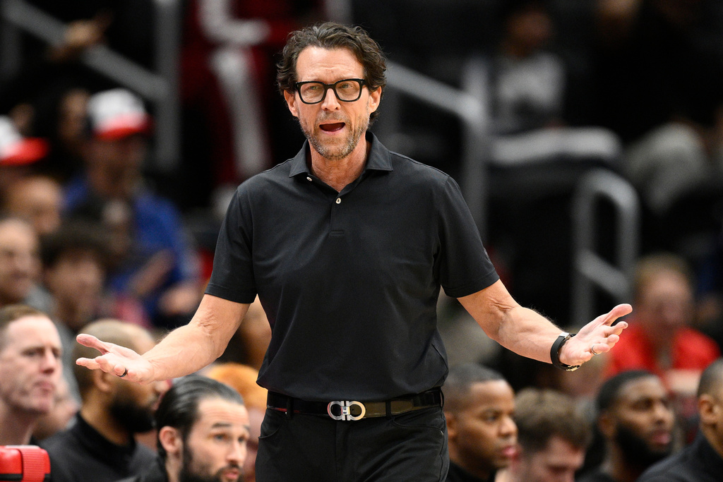 Atlanta Hawks head coach Quin Snyder gestures during the first half of an NBA basketball game against the Washington Wizards, Saturday, Dec. 6, 2025, in Washington. (AP Photo/Nick Wass)