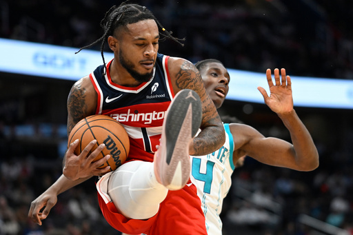 Washington Wizards forward Cam Whitmore (1) pulls down a rebound against Charlotte Hornets forward Moussa Diabate, right, during the first half of an NBA basketball game Sunday, Oct. 26, 2025, in Washington. (AP Photo/John McDonnell) Washington Wizards forward Cam Whitmore (1) pulls down a rebound against Charlotte Hornets forward Moussa Diabate, right, during the first half of an NBA basketball game Sunday, Oct. 26, 2025, in Washington. (AP Photo/John McDonnell)
