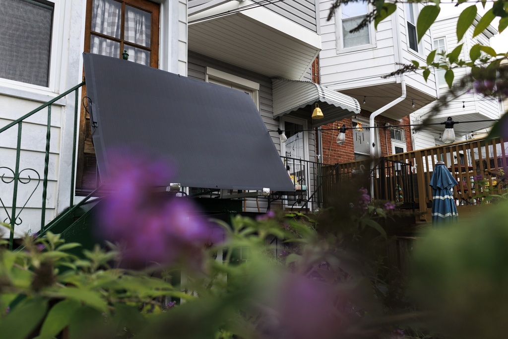 A solar panel fromBright Saver sits at Craig Keenan's home Friday, Aug. 1, 2025, in Baltimore. (AP Photo/KT Kanazawich)