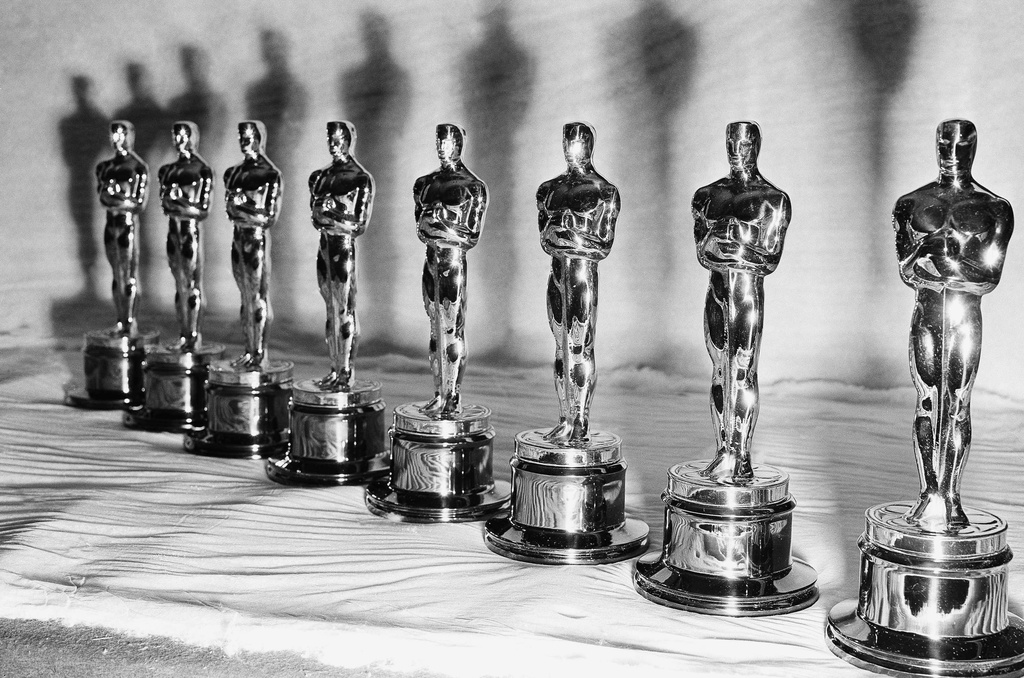 FILE - Oscar statuettes stand in a row, ready for the the presentation of the 22nd annual Academy Awards, in Los Angeles, March 9, 1950. (AP Photo, File)