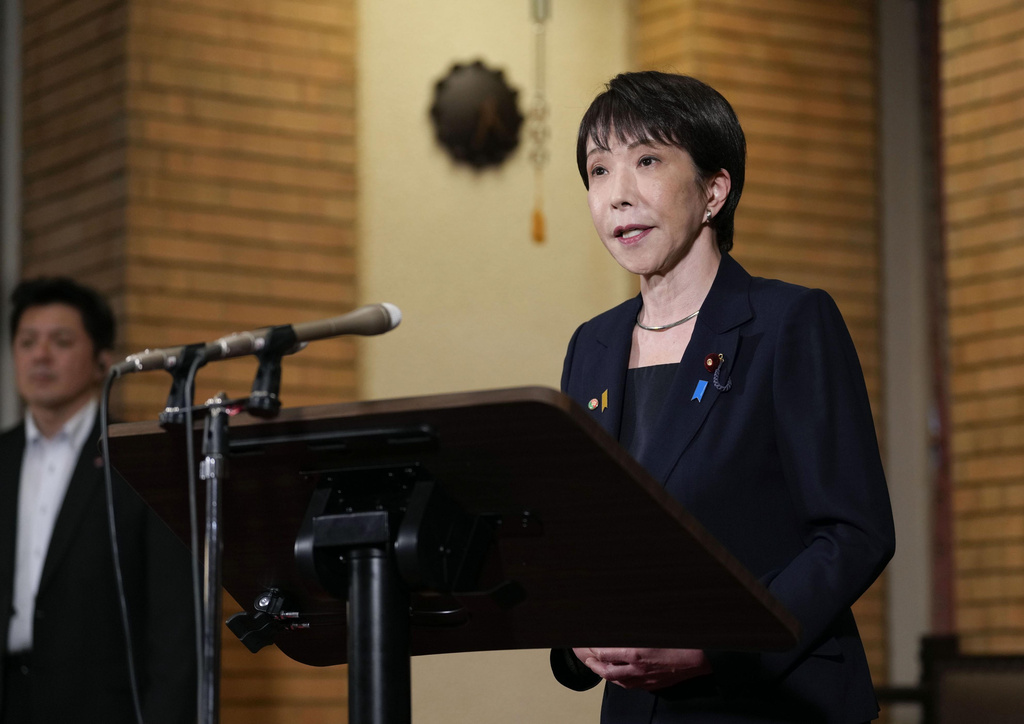 Japanese Prime Minister Sanae Takaichi speaks to reporters during a doorstep at the prime minister's official residence in Tokyo, Thursday, Aug. 13, 2026. (Yuki Sato/Kyodo News via AP)