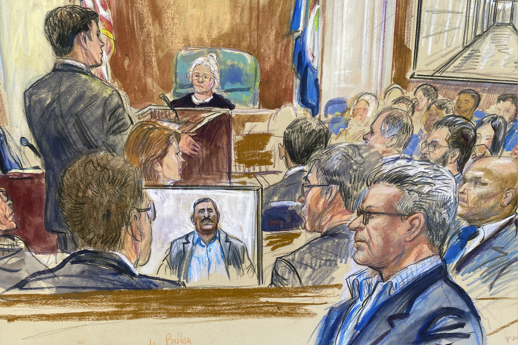 FILE - This artist sketch depicts Salah Al-Ejaili, foreground right with glasses, a former Al-Jazeera journalist, before the U.S. District Court in Alexandria, Va., April 16, 2024. (Dana Verkouteren via AP, File)