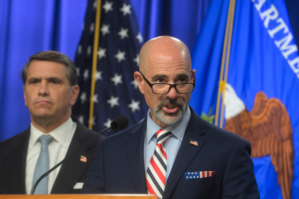 Drug Enforcement Agency Administrator Terry Cole, right, is joined by Acting Attorney General Todd Blanche, left, as he speaks during a news conference at the Department of Justice, Wednesday, August 5, 2026 in Washington. (AP Photo/Rod Lamkey, Jr.)