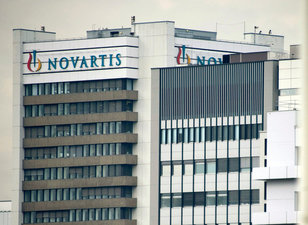 FILE - This Oct. 25, 2011 file photo shows the logo of Swiss pharmaceutical company Novartis AG on one of their buildings in Basel, Switzerland. (Georgios Kefalas/Keystone via AP, File)